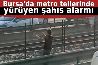 Bursa'da metro tellerinde yürüyen şahıs alarmı