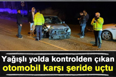 Yağışlı yolda kontrolden çıkan otomobil karşı şeride uçtu