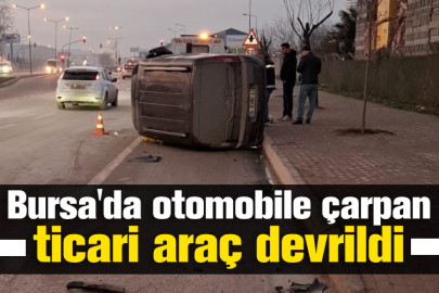 Bursa'da otomobile çarpan ticari araç devrildi